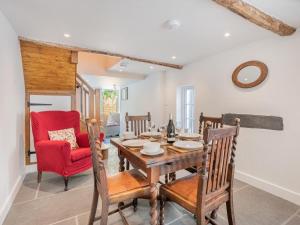 a dining room with a wooden table and chairs at 2 Bed in Staveley SZ590 in Staveley