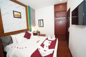 Letto o letti in una camera di NT Elysian hotel