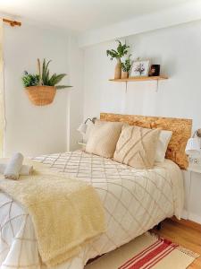 Llit o llits en una habitació de Alojamiento Calma
