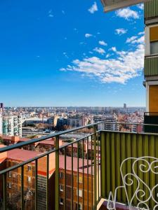 a balcony with a view of a city at Alojamiento Calma in Hospitalet de Llobregat