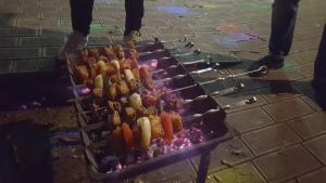a grill with many different types of food on it at Kargi Youth Hostel in Tbilisi City