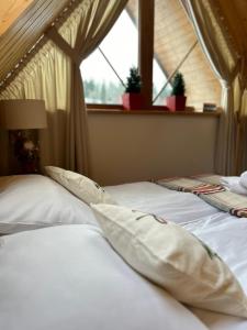 Postel nebo postele na pokoji v ubytování Babcia Góralka house