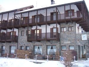 a building with balconies on the side of it at Residence Stofol in Aprica +38 photos