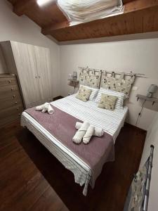 Posteľ alebo postele v izbe v ubytovaní La casa di “Nedda”