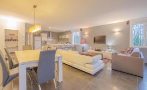 a living room with a couch and a table at Gîte 10G34 in Ville-sur-Arce