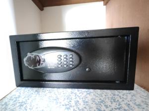 a microwave oven sitting on top of a counter at Wonderful beach bungalow in the south. in Riambel