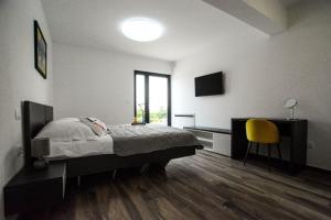 Posteľ alebo postele v izbe v ubytovaní Villa EmMa Istria in Central Istria with sea view, pool heating and underfloor heating