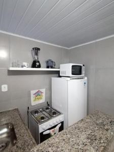 Una cocina o zona de cocina en Moradas São Cristovão - VILA 57