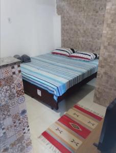 Łóżko lub łóżka w pokoju w obiekcie Moradas São Cristovão - VILA 57