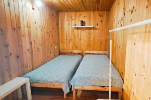 Katil atau katil-katil dalam bilik di Casa da Pedra