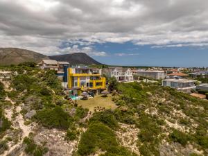 an aerial view of a house on a hill at Crayfish Lodge Sea & Country Guest House in Gansbaai