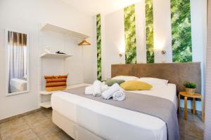Postel nebo postele na pokoji v ubytování Hotel Discovery Thassos