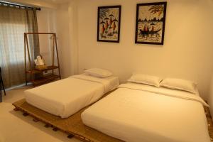 Cama ou camas em um quarto em Remedy Hostel