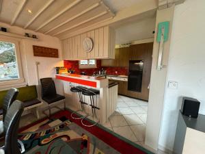a small kitchen with a counter and a sink at Casa Anita in Laax-Murschetg