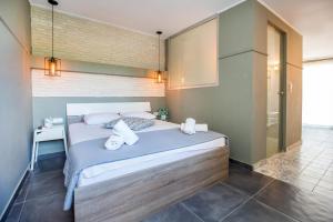 Postel nebo postele na pokoji v ubytování Hotel Discovery Thassos