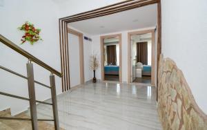 Postel nebo postele na pokoji v ubytování Esmeralda Butik Hotel