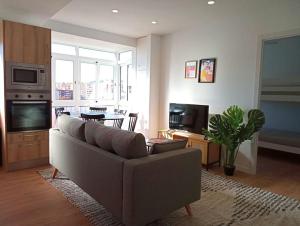 TV a/nebo společenská místnost v ubytování Ático cerca Playa y centro a 10 min.