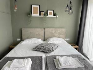 Postel nebo postele na pokoji v ubytování Hotel Discovery Thassos