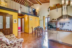 A kitchen or kitchenette at Tuscan Sun With Shared Pool - Happy Rentals