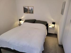 Postel nebo postele na pokoji v ubytování Appartement am Stadtmuseum - ruhig und zentral gelegen
