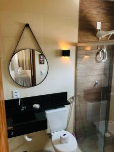 Ein Badezimmer in der Unterkunft Flat Safira com hidro - Chapada dos Veadeiros