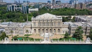 a large building sitting on top of a body of water at Beşiktaş Serenity Hotel in Istanbul