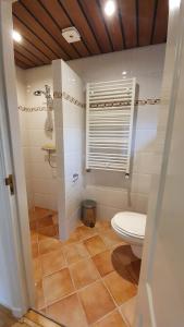 Koupelna v ubytování Bungalow Uthof