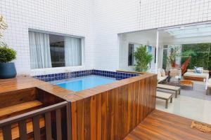 Πισίνα στο ή κοντά στο Linda cobertura em Bertioga