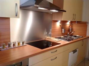 a kitchen with a sink and a counter top at Allées Provençales in Aix-en-Provence