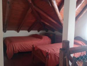 Tempat tidur dalam kamar di Los Duendes de Adriel
