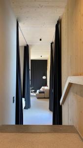 Rúm í herbergi á Hideaway Planneralm operated by JUFA Hotels