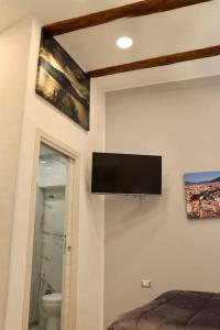 TV o dispositivi per l'intrattenimento presso Casa We Love Napoli