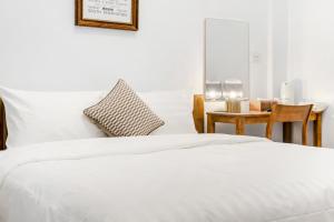 Katil atau katil-katil dalam bilik di Sunset Mu Style Inn