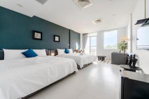 Katil atau katil-katil dalam bilik di Sunset Mu Style Inn