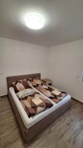 Postel nebo postele na pokoji v ubytování Anamarija apartmani