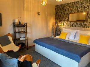 Posteľ alebo postele v izbe v ubytovaní Resort Lesní Lázně