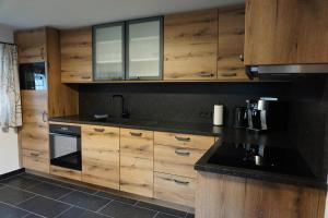 Kuchyň nebo kuchyňský kout v ubytování Apartments Edinger