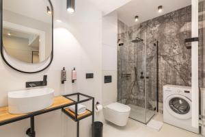 Phòng tắm tại Apartamenty Deo Plaza nad Motlawa by Rent like home