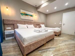 Postel nebo postele na pokoji v ubytování Rumani 3 Islands Hotel
