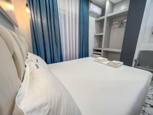 Postel nebo postele na pokoji v ubytování Rumani 3 Islands Hotel