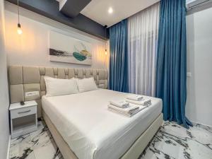 Postel nebo postele na pokoji v ubytování Rumani 3 Islands Hotel