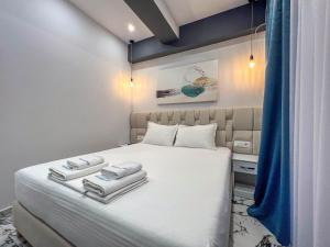 Postel nebo postele na pokoji v ubytování Rumani 3 Islands Hotel