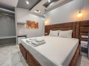Postel nebo postele na pokoji v ubytování Rumani 3 Islands Hotel