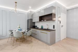 Nhà bếp/bếp nhỏ tại Apartamenty Deo Plaza nad Motlawa by Rent like home