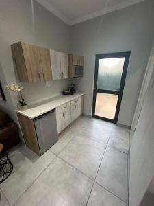 Η κουζίνα ή μικρή κουζίνα στο RR Luxury apartment