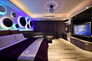 TV a/nebo společenská místnost v ubytování Meng Siang Motel