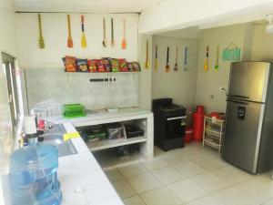 Kuchyň nebo kuchyňský kout v ubytování Amalaya Hostel