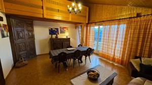 Posezení v ubytování Crans Montana spacious 80m2 apartment with stunning view & bus stop outside