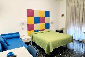 Postel nebo postele na pokoji v ubytování B&B Vittoria