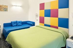 Postel nebo postele na pokoji v ubytování B&B Vittoria